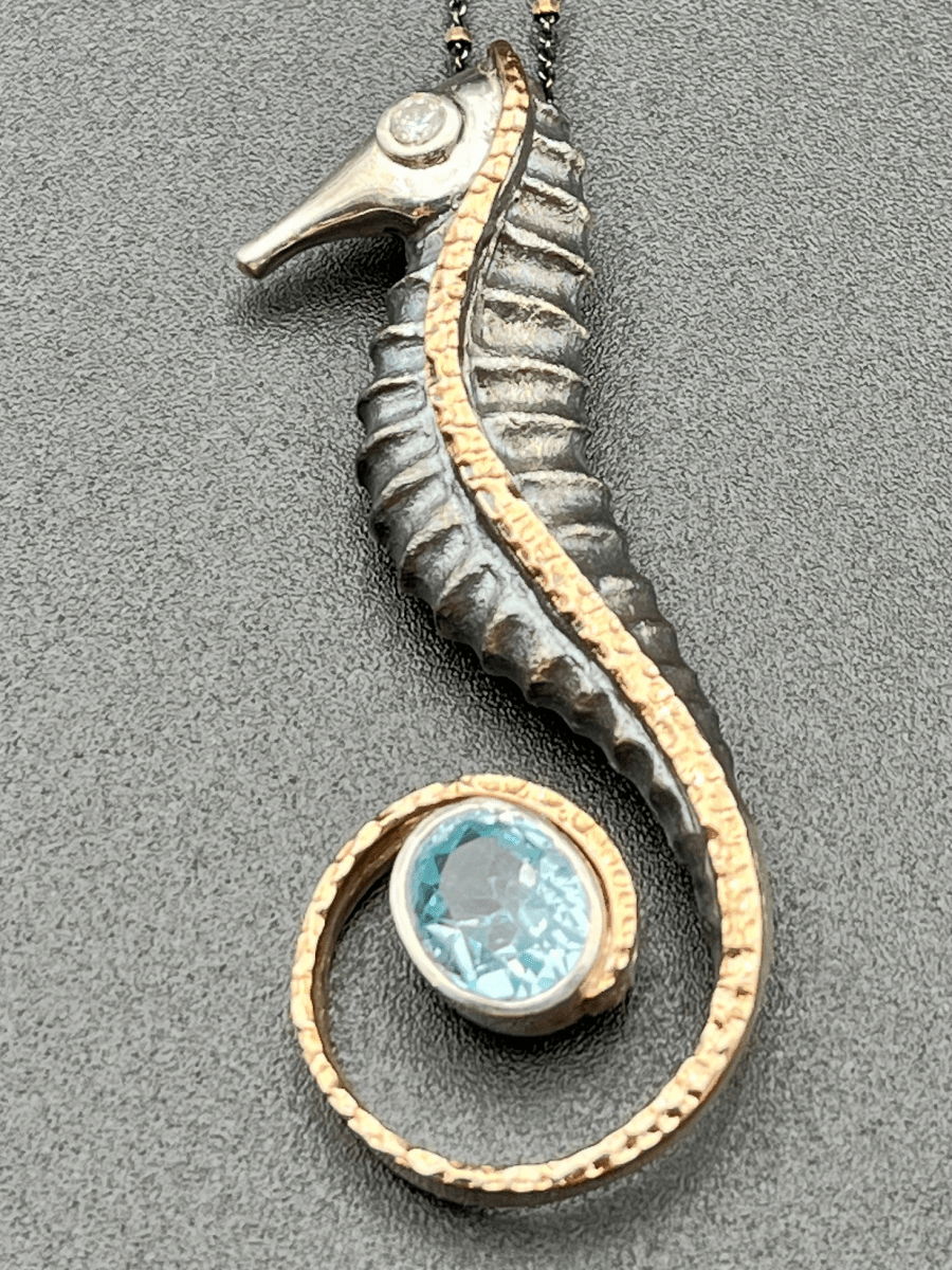 Blue Topaz in a Seahorse Tail NecklaceBORANECKLACES
