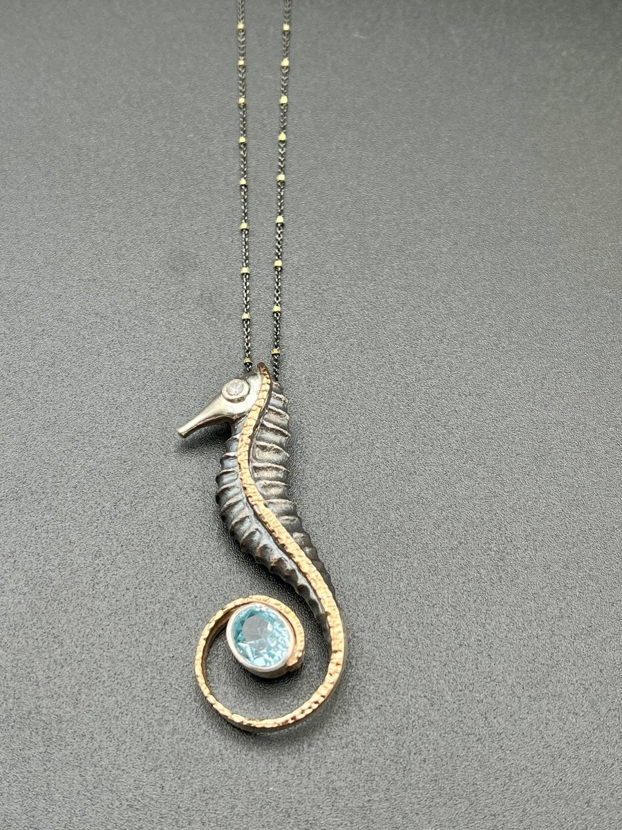 Blue Topaz in a Seahorse Tail NecklaceBORANECKLACES