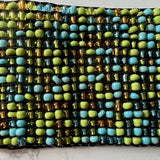 Hand loomed glass beaded belt wood scroll in lime turq mixErik & Mike