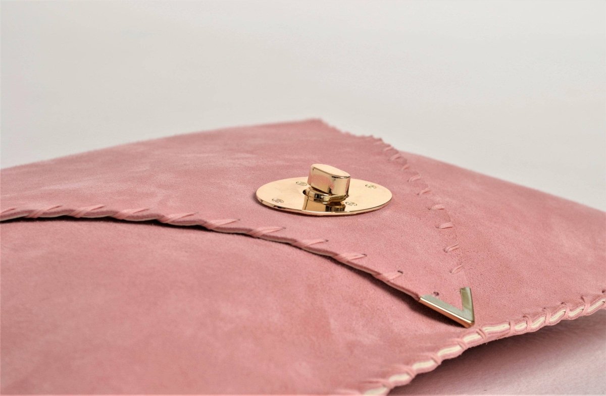 Large Suede clutch in pink: Gold hardwareANA KOUTSIACCESS