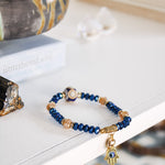 Blue & Peach Glass Beaded Bracelet w Evil Eye PendantJ.GainoBracelet