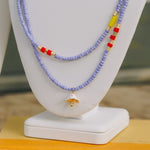 Long Blue & White Seed, Orange & Yellow Glass Bead NecklaceRobin JacksonNecklaces