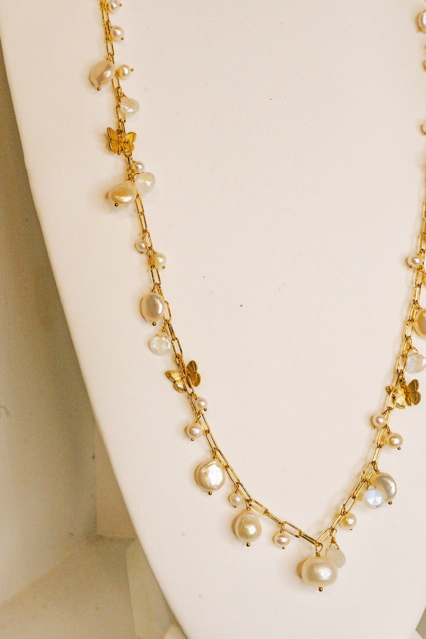 Long Coin Freshwater Pearl, Moonstone, & Butterfly CharmsBeth ZinkNecklace