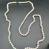 Opera length white pearls