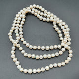 Opera length white pearls