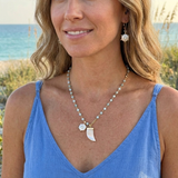 White coin pearl with blue topaz earrings