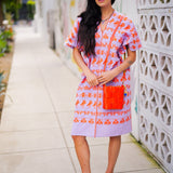 The Mini Tula Tangerine Crossbody Bag