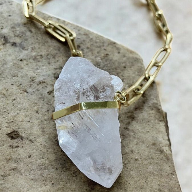 Large Clear Quartz on Single Strand of BronzeMolaNECKLACES