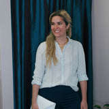 Leather clutch in whiteANA KOUTSIBAGS