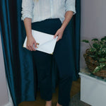 Leather clutch in whiteANA KOUTSIBAGS