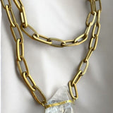 Smooth Clear Quartz Crystal in BronzeMolaNECKLACES