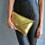 Sparkling clutch in goldANA KOUTSIBAGS
