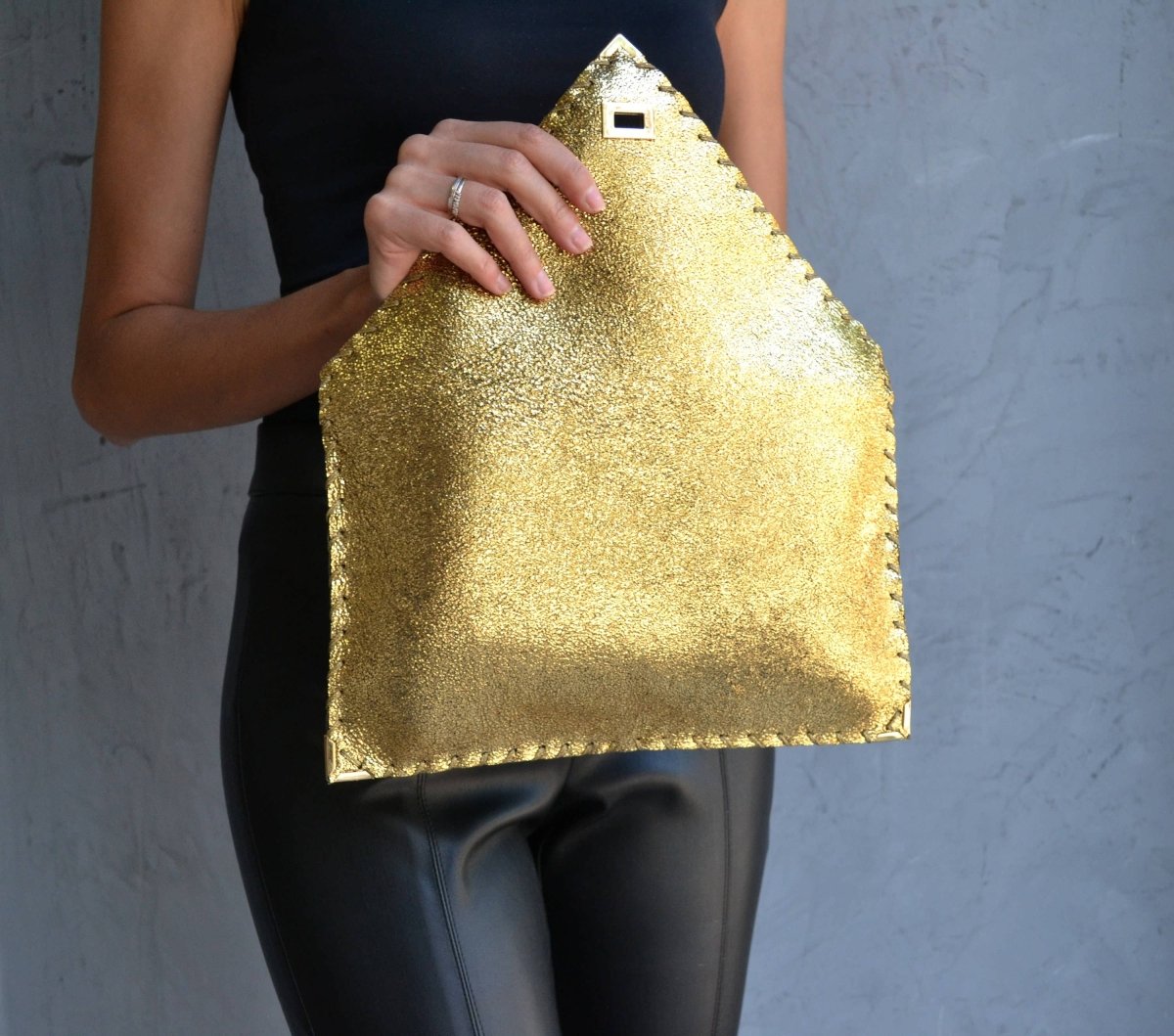 Sparkling clutch in goldANA KOUTSIBAGS