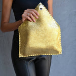 Sparkling clutch in goldANA KOUTSIBAGS