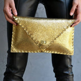 Sparkling clutch in goldANA KOUTSIBAGS
