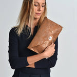 Sparkling leather clutch in bronzeANA KOUTSIBAGS