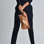 Sparkling leather clutch in bronzeANA KOUTSIBAGS