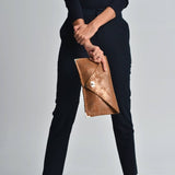 Sparkling leather clutch in bronzeANA KOUTSIBAGS