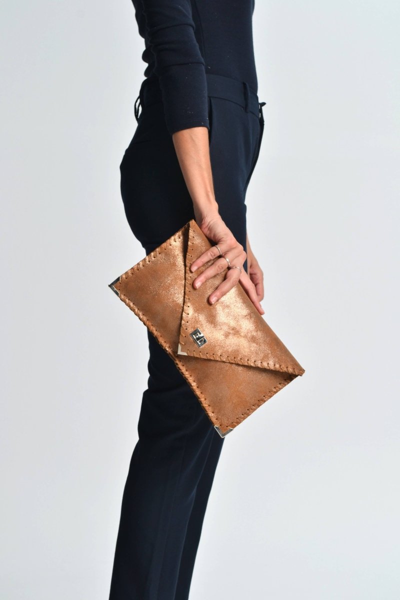 Sparkling leather clutch in bronzeANA KOUTSIBAGS