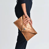Sparkling leather clutch in bronzeANA KOUTSIBAGS
