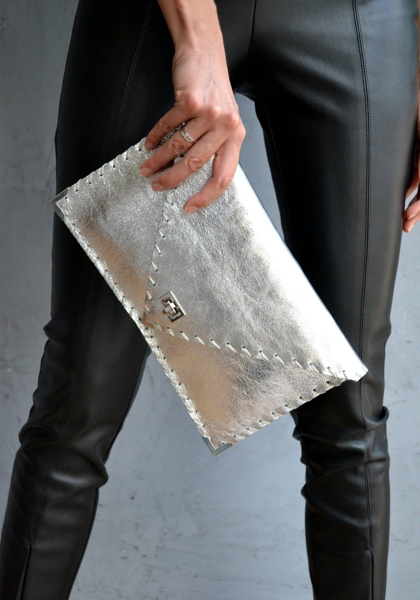 Symmetria leather clutch in silverANA KOUTSI