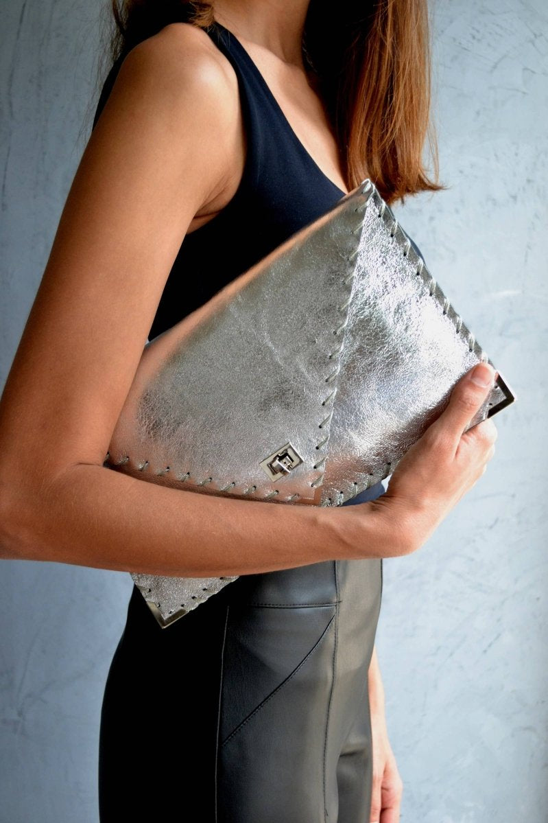 Symmetria leather clutch in silverANA KOUTSI