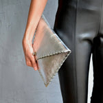 Symmetria leather clutch in silverANA KOUTSI