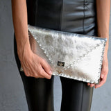 Symmetria leather clutch in silverANA KOUTSI