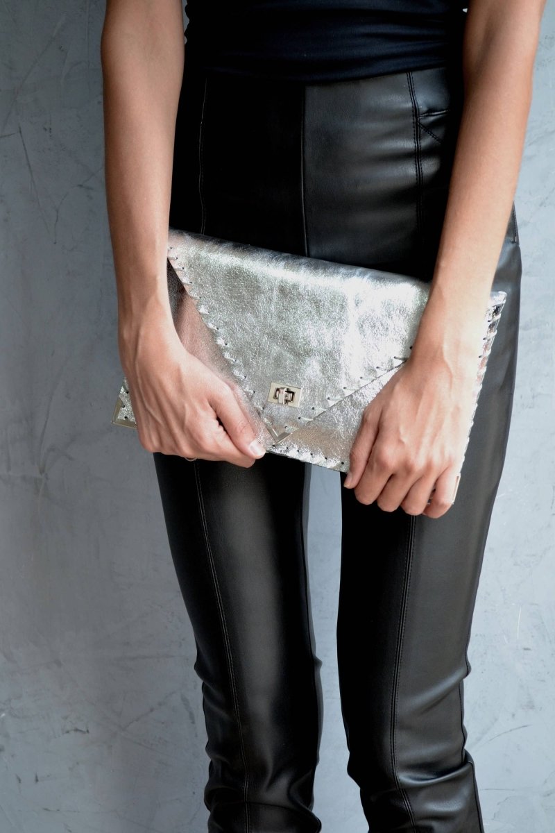 Symmetria leather clutch in silverANA KOUTSI