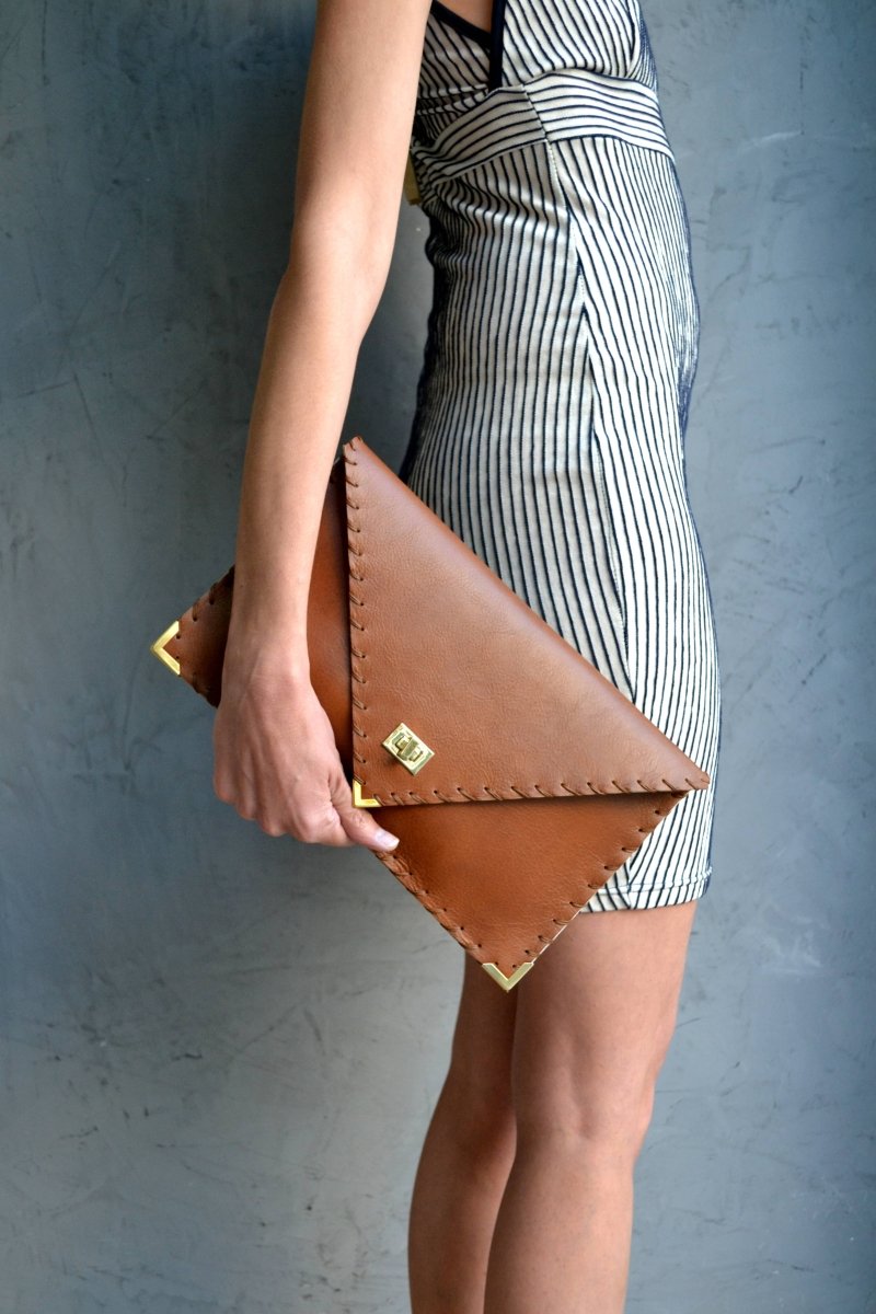 Symmetria leather clutch in tabac brown: Gold / SmallANA KOUTSI