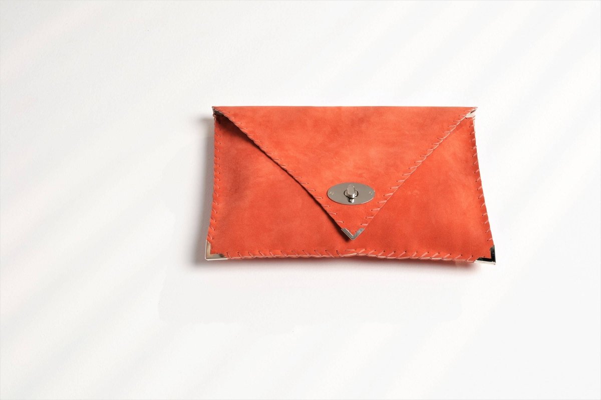 Symmetria soft cluth in coral: Gold / SmallANA KOUTSIBAGS